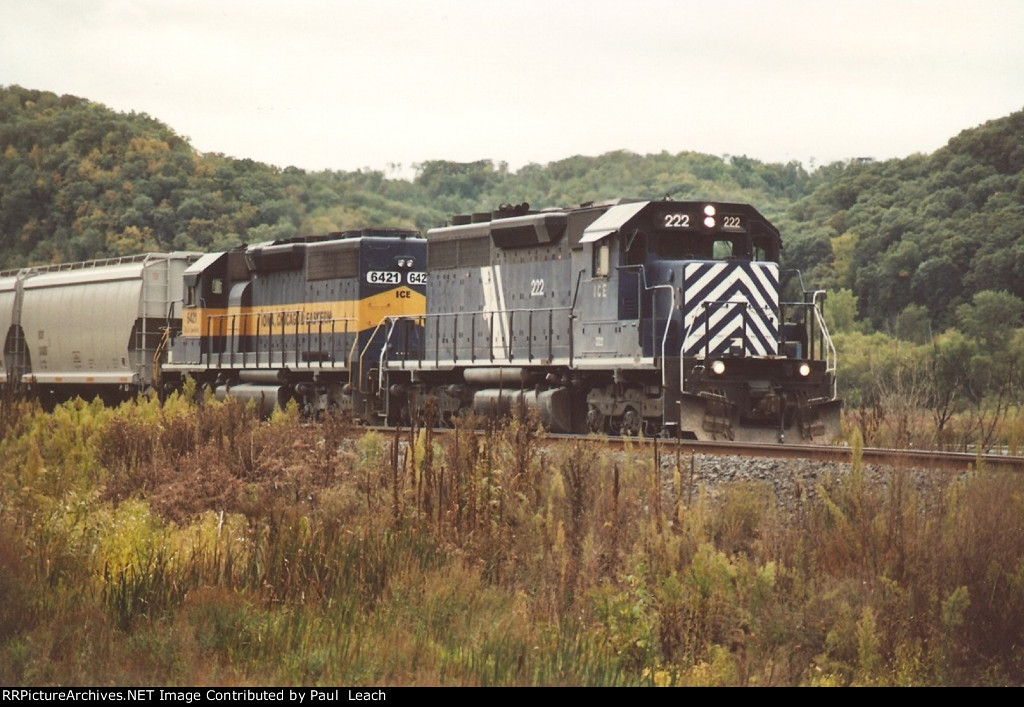 Westbound manifest eases down the siding